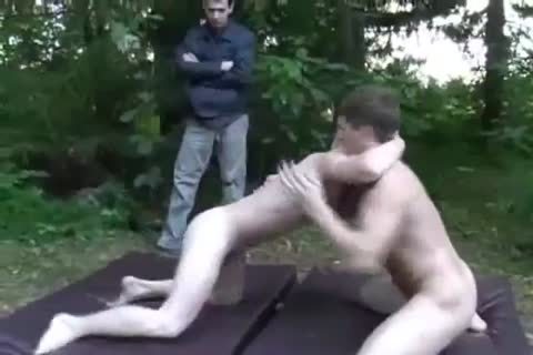 Two dudes wrestle